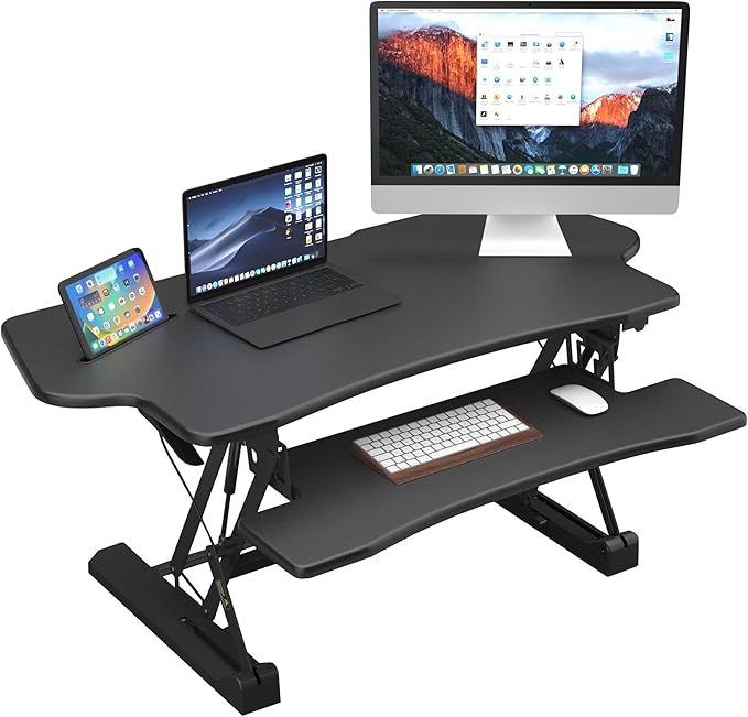 Mount-It! Standing Desk Converter, 48" Wide Sit Stand Desk Riser with Dual Gas Spring Handles, Height Adjustable from 6"–19.25", Extra Large Tabletop for 2 Monitors, Keyboard Tray & Device Slot, Black