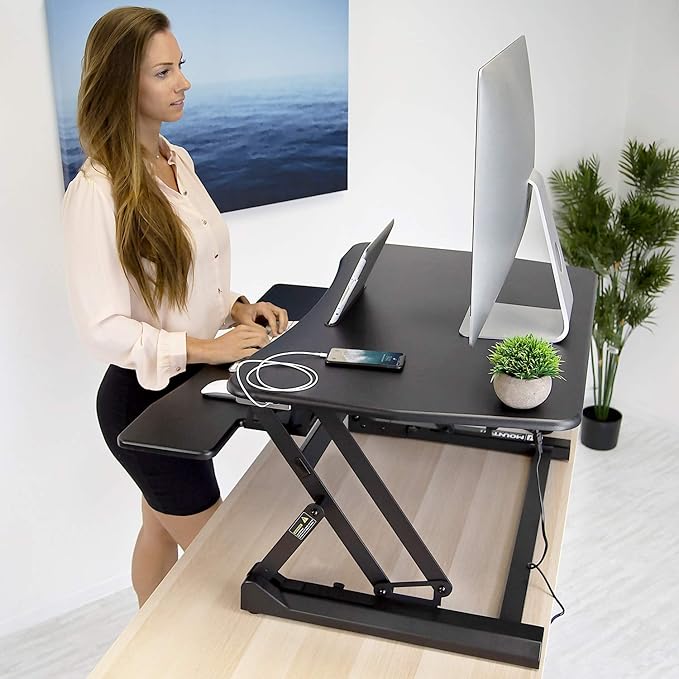 Mount-It! Electric Standing Desk Converter 35.4" Quick Sit Stand Desk Riser, Computer Workstation Motorized Easy Convertor with Built-in USB Charging Port, Ergonomic Height Adjustable in Black