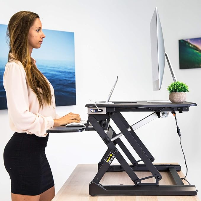 Mount-It! Electric Standing Desk Converter 35.4" Quick Sit Stand Desk Riser, Computer Workstation Motorized Easy Convertor with Built-in USB Charging Port, Ergonomic Height Adjustable in Black