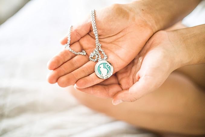 Wild Essentials Pretty Kitty Cat Necklace Essential Oil Diffuser Kit, Lavender, Lemongrass, Peppermint, Orange Oils, 12 Refill Pads, Calming Aromatherapy Gift Set, Customizable Color Changing, Perfume